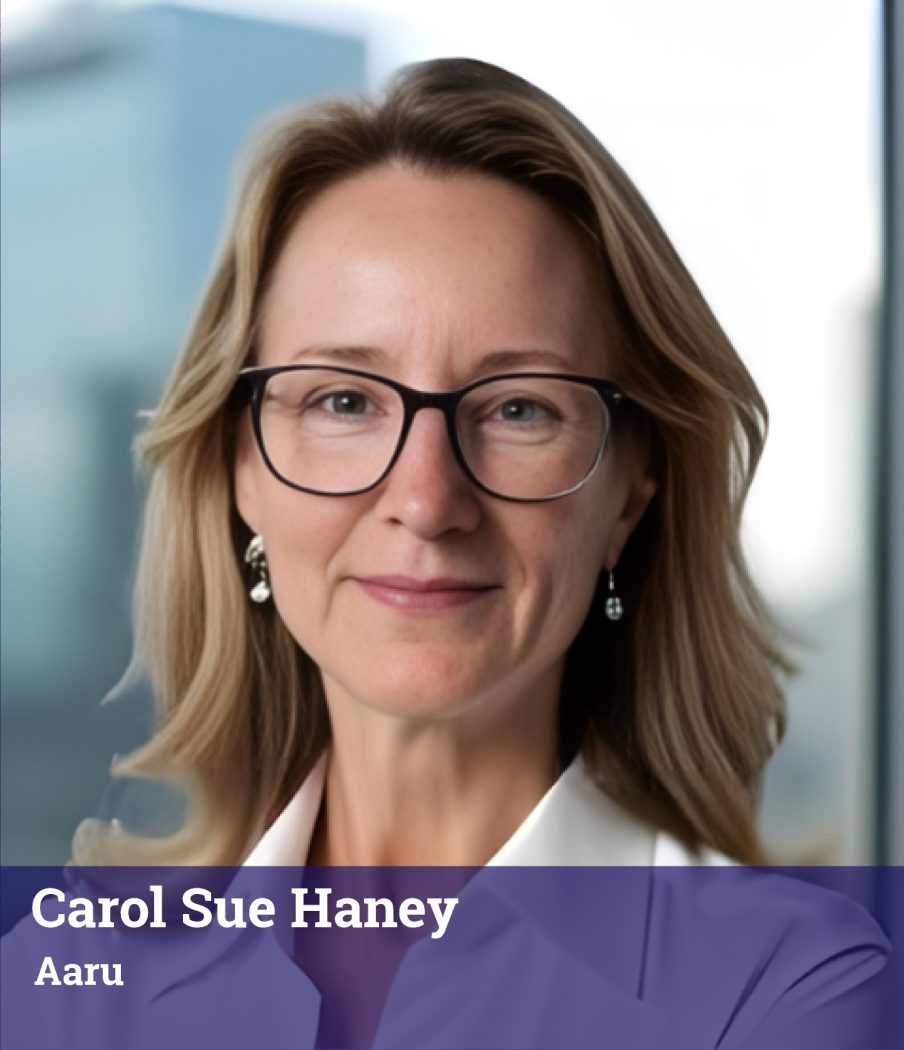 A woman with shoulder-length blonde hair and glasses, wearing a suit jacket, stands in front of a blurred office background. Text reads: “Carol Sue Haney, Aaru.”.